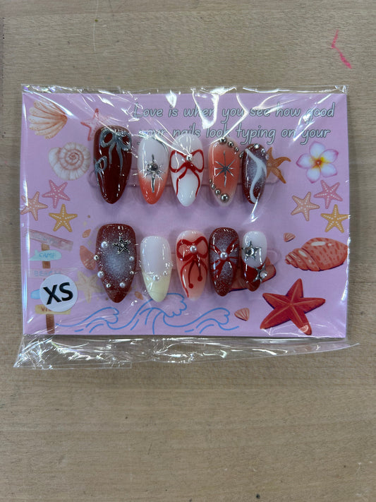 Bows and Starlight Press on Nails